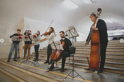 Olga Pyshchyta (violin), Stanislav Kucherenko (violin), Tetyana Zhuk (viola),  Denis Karachevtsev (cello)  and Serhiy Dikarev (double bass) --- please check out the pictures of the uplifiting concert on the [KharkivMusicFest](https://www.instagram.com/p/Cbmm7YftKiY/?utm_source=ig_web_copy_link) Instagram gallery.